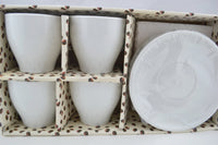 set of white cappuccino cups
